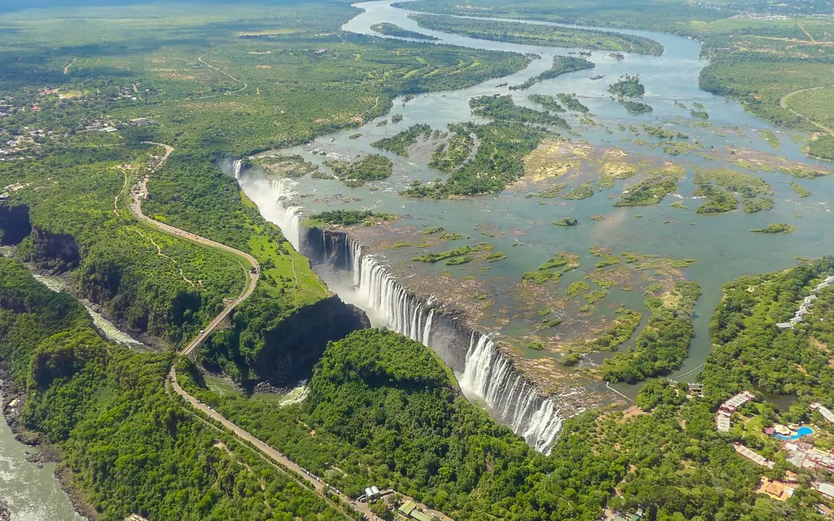 The full curtain of Victoria Falls filmed from a helicopter