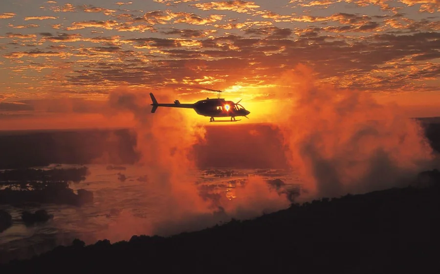 A sunset cruise on the Zambezi after a helicopter flight over the falls